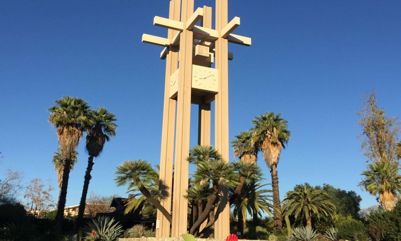 pitzer clock tower in front of a blue sky